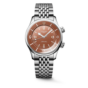 Il Longines Legend Diver L3.764.4.96.6 è un orologio automatico da 39 mm con cassa e bracciale in acciaio inossidabile, caratterizzato da un elegante quadrante terracotta con numeri arabi e indici dipinti, e lancette argentate luminescenti Swiss Super-LumiNova®. Equipaggiato con il calibro automatico L888 con bilanciere-spirale in silicio monocristallino, offre una riserva di carica di circa 72 ore. La lunetta interna girevole da sub e la corona a vite garantiscono un’impermeabilità fino a 300 metri. Il vet